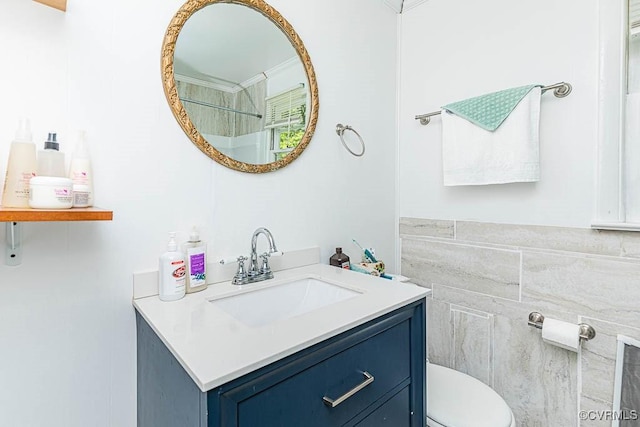 bathroom with vanity and toilet