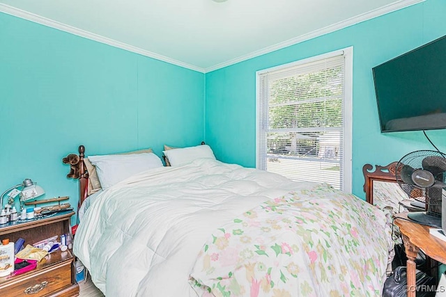 bedroom featuring ornamental molding