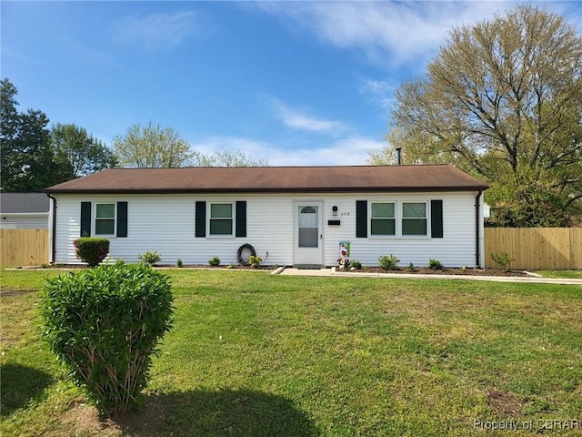 single story home with a front yard and fence