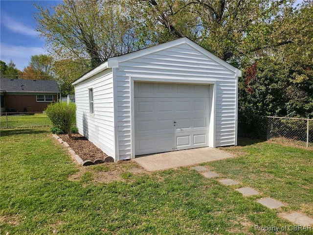 detached garage with fence