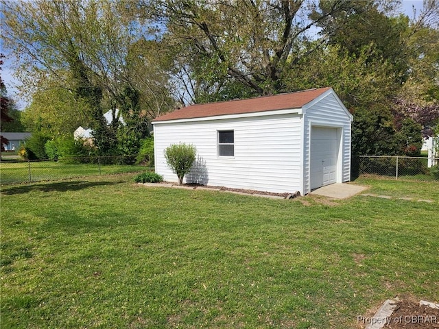 view of outbuilding with a fenced backyard and an outdoor structure