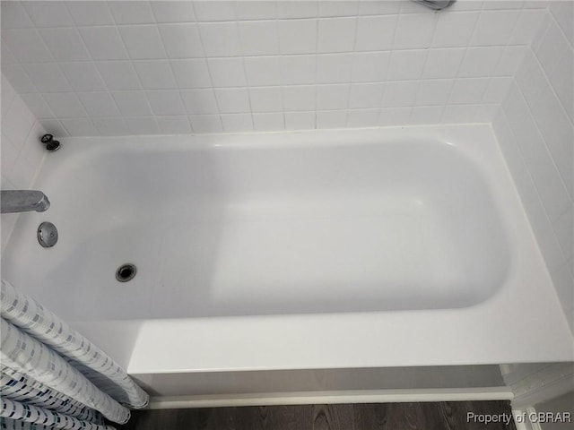 bathroom with a bathing tub