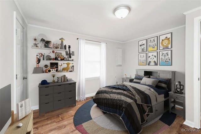 932 Eastern View Rd, King & Queen, VA 23148 - bedroom featuring light wood-style flooring, crown molding, and baseboards