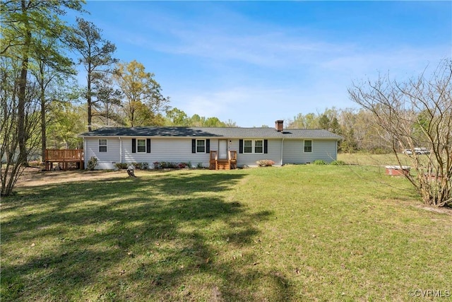 932 Eastern View Rd, King & Queen, VA 23148 - back of property featuring a yard, a chimney, and a deck