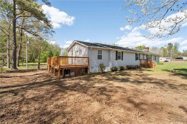 932 Eastern View Rd, King & Queen, VA 23148 - view of side of property with a chimney and a deck