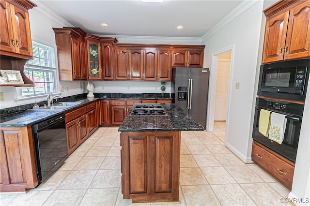 kitchen featuring crown molding, a kitchen island, a sink, and black appliances