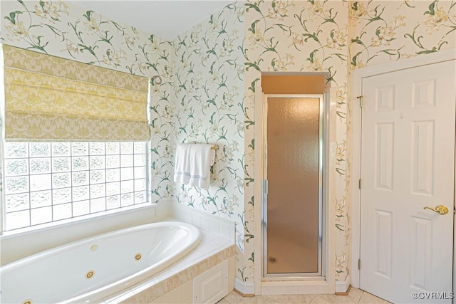 bathroom with tile patterned flooring, a whirlpool tub, a shower stall, and wallpapered walls