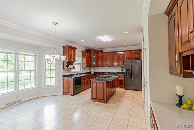 kitchen with visible vents, ornamental molding, appliances with stainless steel finishes, and dark countertops