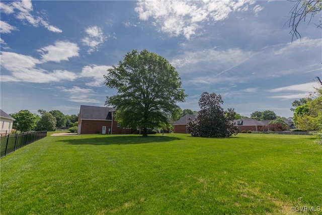 view of yard with fence