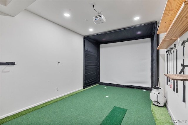 carpeted cinema with baseboards, golf simulator, and recessed lighting