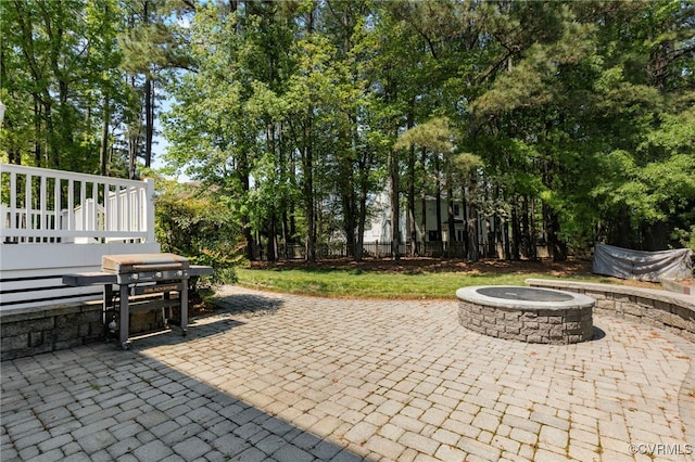view of patio featuring a fire pit