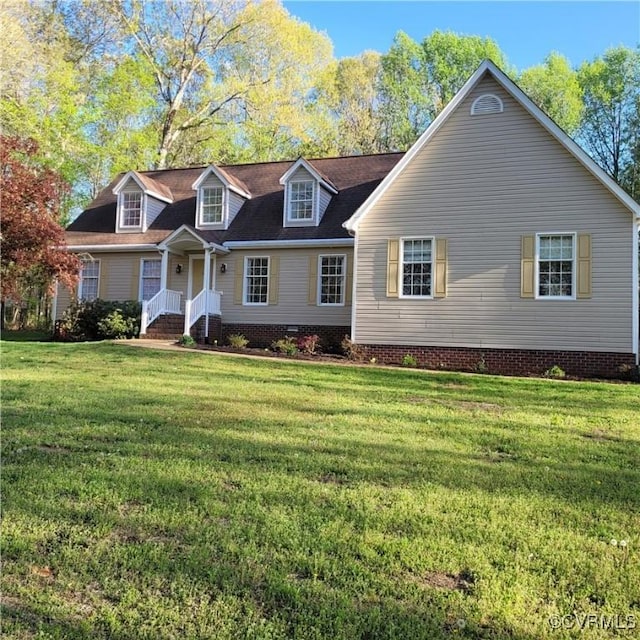cape cod house with a front yard and crawl space