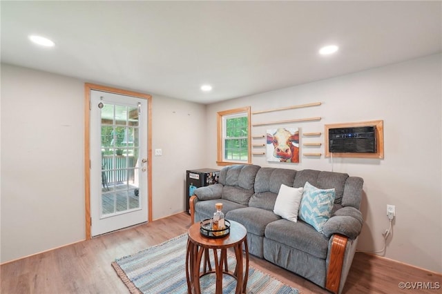 12211 Mill Race Run, Amelia, VA 23002 - living area with a wall mounted air conditioner, recessed lighting, and wood finished floors