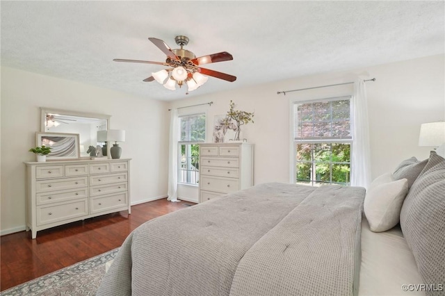 12211 Mill Race Run, Amelia, VA 23002 - bedroom featuring a ceiling fan, baseboards, and dark wood finished floors