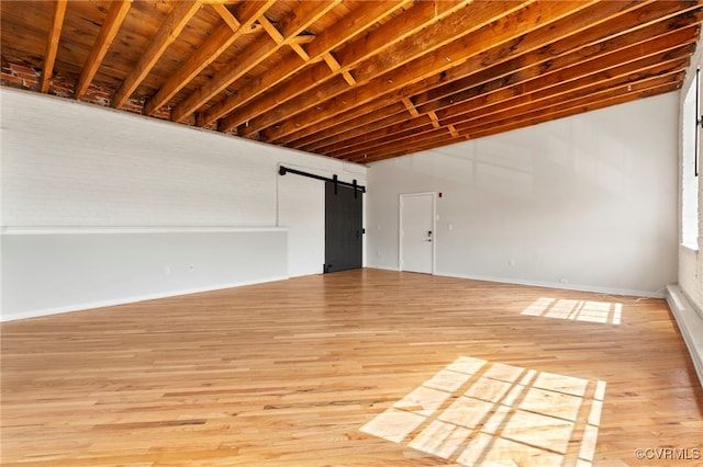 1716 Summit Ave Unit 30, Richmond, VA 23230 - interior space featuring light wood-style floors, baseboards, and a barn door