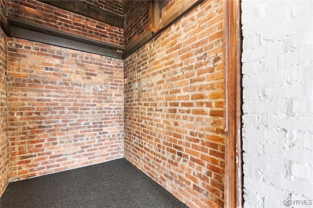 1716 Summit Ave Unit 30, Richmond, VA 23230 - spare room with brick wall and carpet