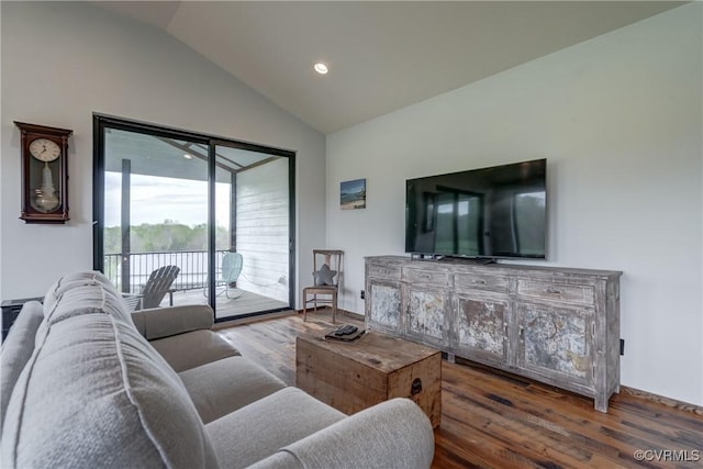 living room featuring vaulted ceiling, wood finished floors, and recessed lighting
