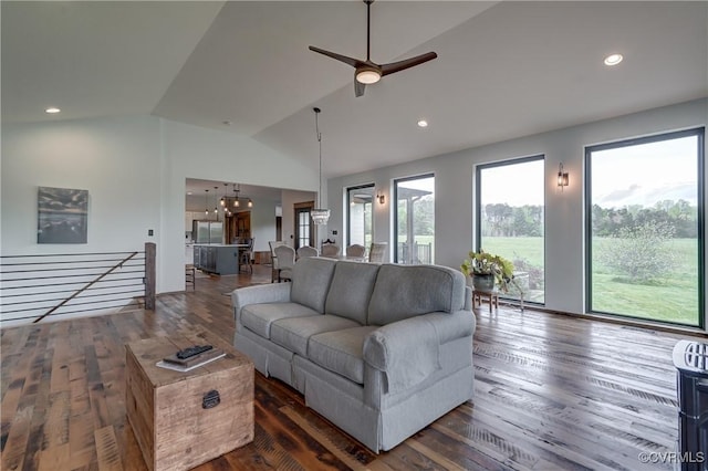 living room featuring recessed lighting, wood finished floors, and ceiling fan with notable chandelier