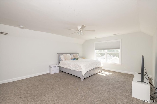 bedroom featuring ceiling fan, visible vents, vaulted ceiling, baseboards, and carpet