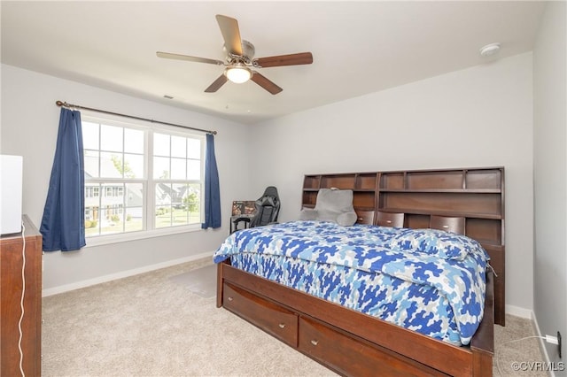 bedroom featuring baseboards, visible vents, ceiling fan, and carpet