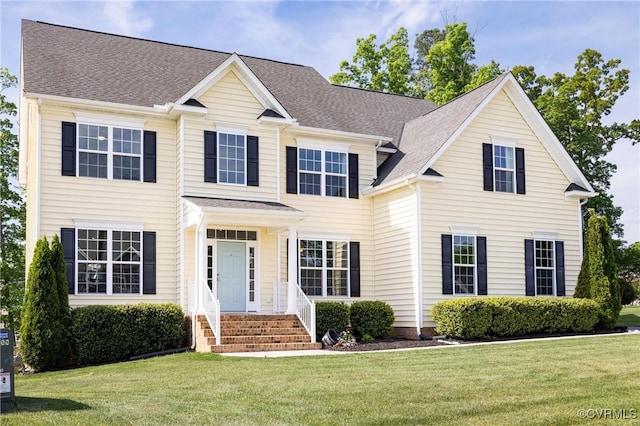 9325 Lavenham Ct, Midlothian, VA 23112 - colonial-style house featuring roof with shingles and a front lawn