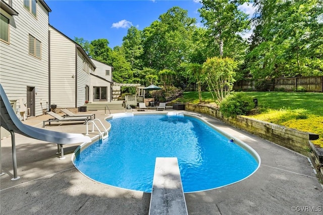 3 Welwyn Pl, Henrico, VA 23229 - view of pool featuring a water slide, a diving board, a patio area, view of wooded area, and a deck