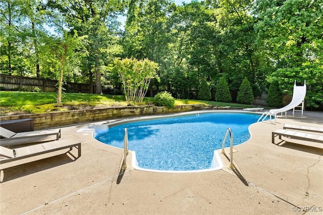 3 Welwyn Pl, Henrico, VA 23229 - view of swimming pool with a water slide, a patio area, and view of scattered trees