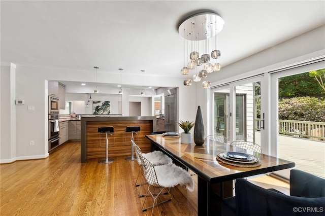 3 Welwyn Pl, Henrico, VA 23229 - dining area featuring light wood-type flooring and baseboards