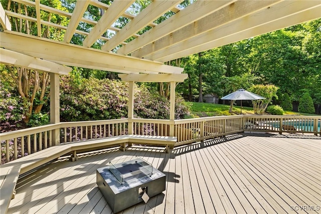 3 Welwyn Pl, Henrico, VA 23229 - wooden terrace with an outdoor fire pit, view of scattered trees, an outdoor pool, and a pergola