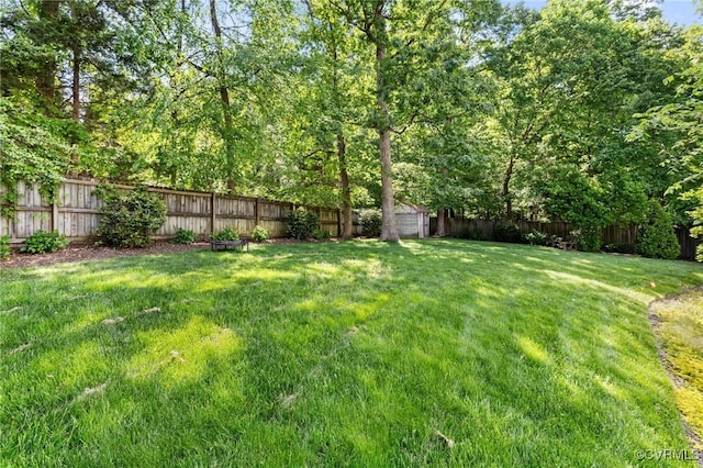 3 Welwyn Pl, Henrico, VA 23229 - view of yard featuring a storage unit and an outbuilding