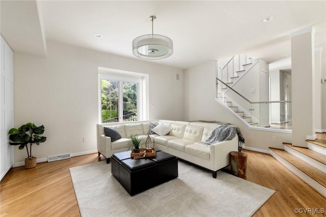 3 Welwyn Pl, Henrico, VA 23229 - living area featuring stairs, light wood-type flooring, baseboards, and recessed lighting