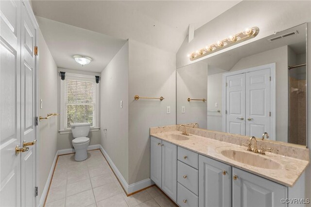 full bathroom with a sink, tile patterned flooring, visible vents, and double vanity