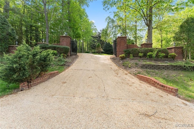 view of gate featuring fence