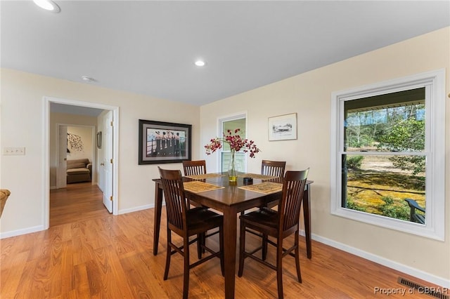 637 Mallard Bay Dr, Heathsville, VA 22473 - dining room featuring light wood-style flooring, recessed lighting, and baseboards