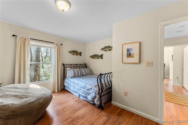 637 Mallard Bay Dr, Heathsville, VA 22473 - bedroom with light wood-type flooring and baseboards