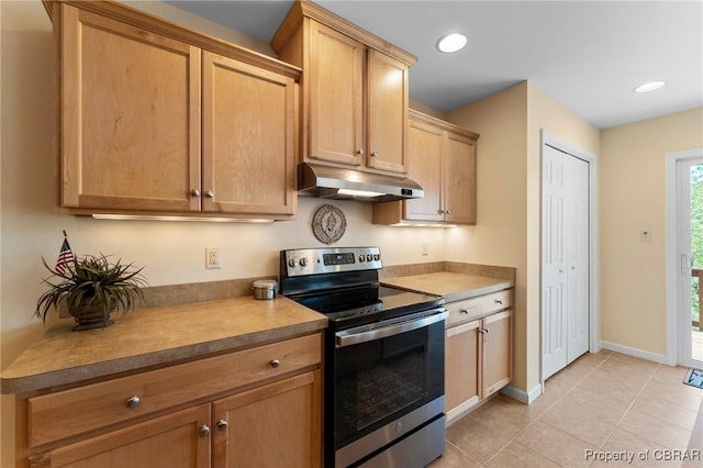 637 Mallard Bay Dr, Heathsville, VA 22473 - kitchen with light tile patterned floors, recessed lighting, electric range, and under cabinet range hood