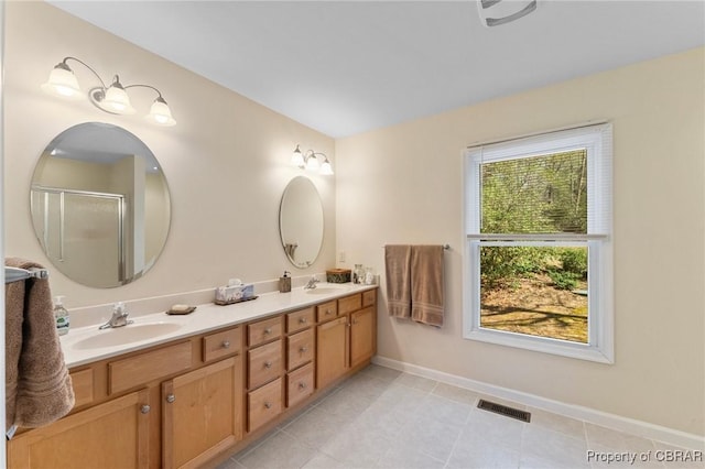 637 Mallard Bay Dr, Heathsville, VA 22473 - full bath with a sink, visible vents, baseboards, and double vanity