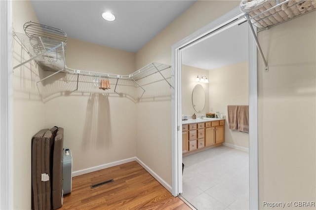 637 Mallard Bay Dr, Heathsville, VA 22473 - spacious closet featuring visible vents and light wood-type flooring