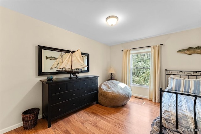 637 Mallard Bay Dr, Heathsville, VA 22473 - bedroom with visible vents, baseboards, and light wood finished floors