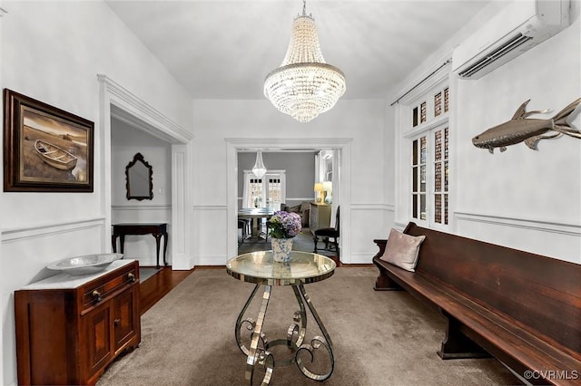 entryway with a wall mounted AC and a chandelier