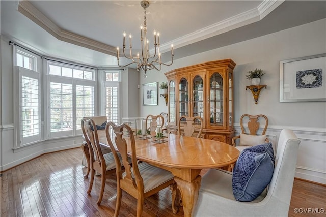 2600 Mulberry Row Rd, Midlothian, VA 23113 - dining space featuring healthy amount of natural light, a chandelier, ornamental molding, wood-type flooring, and a tray ceiling