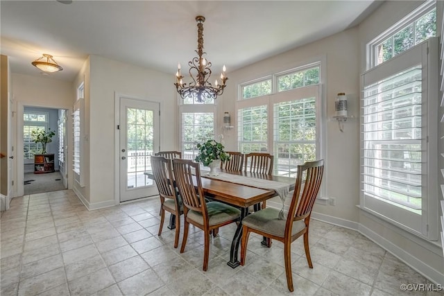 2600 Mulberry Row Rd, Midlothian, VA 23113 - dining room with plenty of natural light, a chandelier, and baseboards