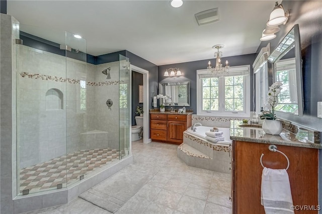 2600 Mulberry Row Rd, Midlothian, VA 23113 - bathroom with toilet, a chandelier, a stall shower, vanity, and a bath