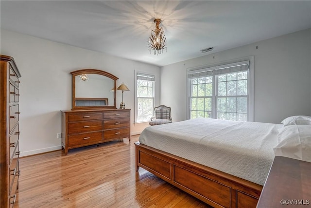 2600 Mulberry Row Rd, Midlothian, VA 23113 - bedroom featuring light wood finished floors, baseboards, and a chandelier