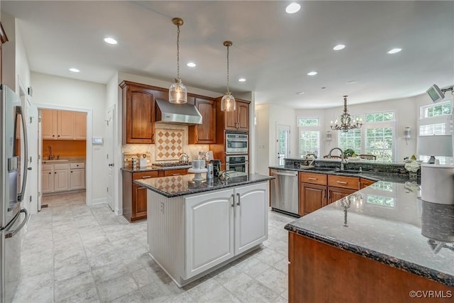 2600 Mulberry Row Rd, Midlothian, VA 23113 - kitchen featuring a large island, stainless steel appliances, a sink, wall chimney range hood, and recessed lighting