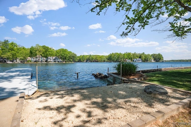 dock area featuring a water view