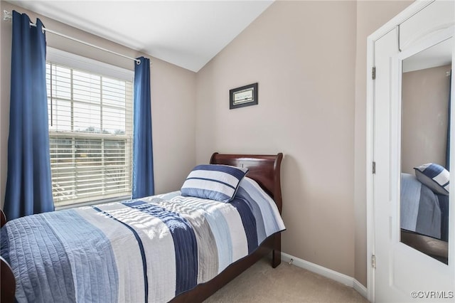 17318 Library Blvd, Ruther Glen, VA 22546 - carpeted bedroom featuring baseboards and vaulted ceiling