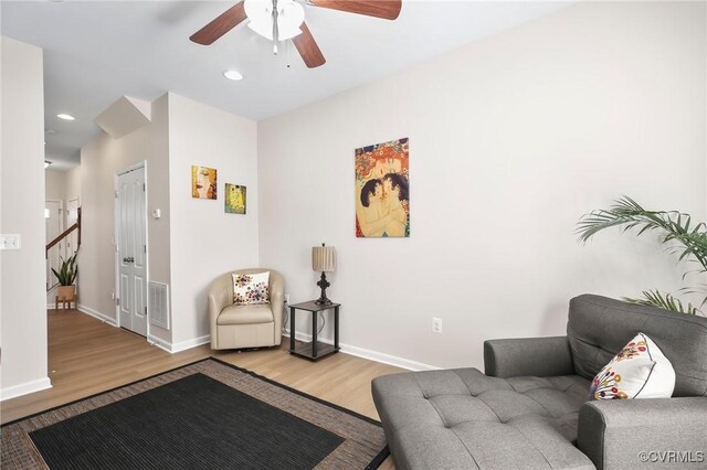 17318 Library Blvd, Ruther Glen, VA 22546 - living room featuring visible vents, ceiling fan, wood finished floors, and baseboards