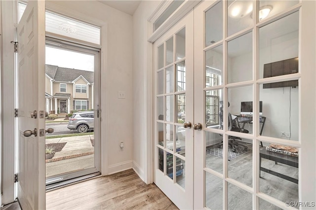 6177 Bowline Ln, Richmond, VA 23234 - entryway with french doors, healthy amount of natural light, and wood finished floors