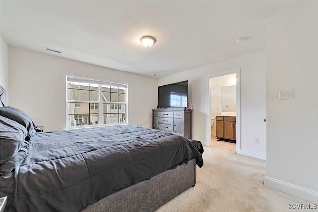 6177 Bowline Ln, Richmond, VA 23234 - bedroom featuring light colored carpet and ensuite bathroom